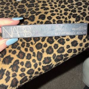 NARS lip gloss in mythic red